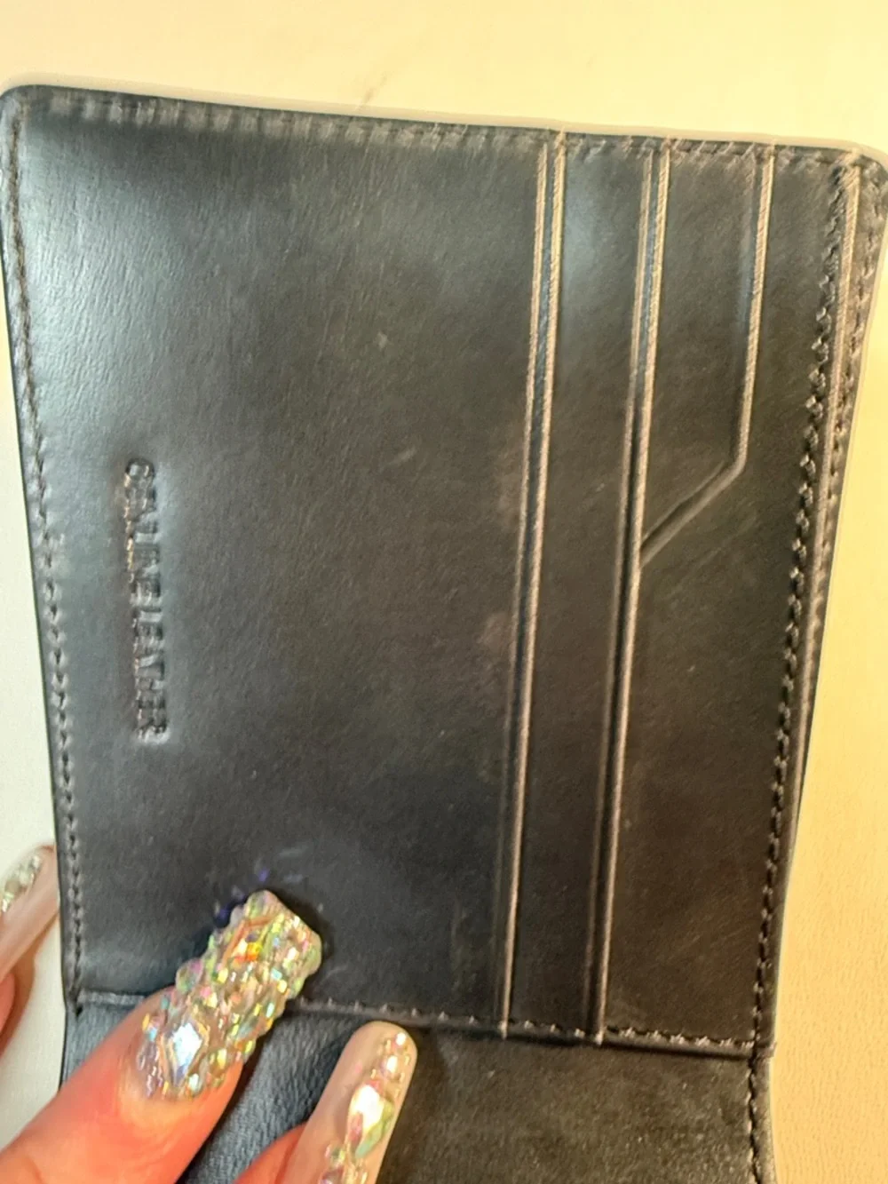 Cole Haan Black Leather Folded Wallet with Embossed Logo